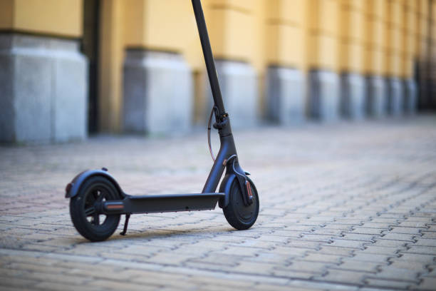 istock Eco friendly transport electro scooter city transport ride 1218438853