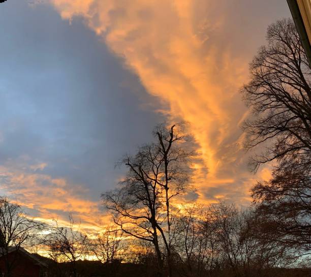 istock colorful, dramatic sunset over Miesbach, Bavaria 1218439103
