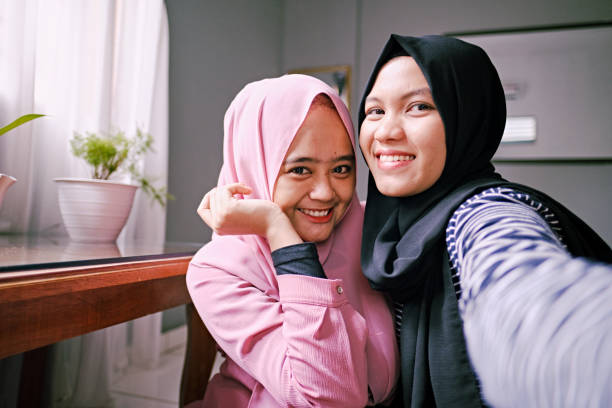 istock Two Beautiful Indonesian Women Selfie 1218443345