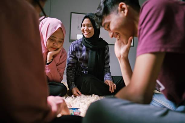 istock Small Group of Indonesian People Happily during Ramadan 1218443403