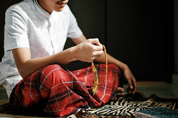 istock Portrait of Islam Man Praying during Ramadan 1218444571