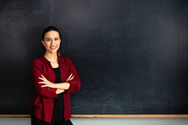 istock Young Woman Teacher 1218447348