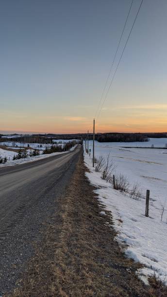 istock Sunset over the snowy fields of the Townships (photo7) 1218447459