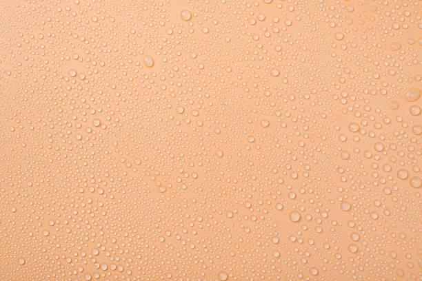 Top above overhead view photo of little drops of water on beige background Top above overhead view photo of little drops of water on beige background carbonated photos stock pictures, royalty-free photos & images