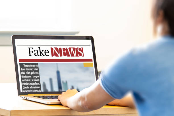 istock A female reading fake news on a computer laptop 1218451867