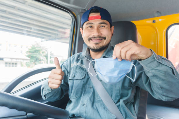 istock Truck driver wearing a mask 1218452006