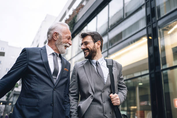 istock Carefree business coworkers enjoying talking after work 1218453025