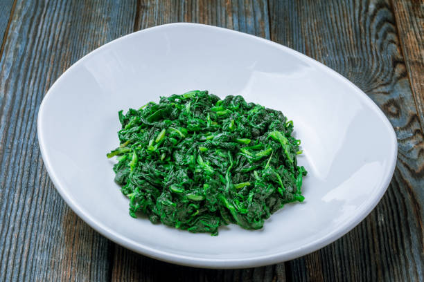 Garnish steamed spinach stock photo