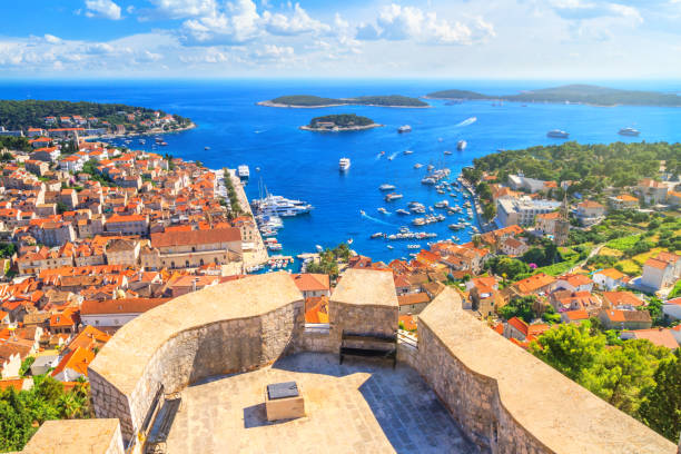 Coastal summer landscape - top view of the City Harbour and marina of the town of Hvar from the fortress, on the island of Hvar Coastal summer landscape - top view of the City Harbour and marina of the town of Hvar from the fortress, on the island of Hvar, the Adriatic coast of Croatia hvar photos stock pictures, royalty-free photos & images