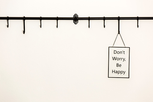 ''Don't Worry Be Happy'' text at the hanger.