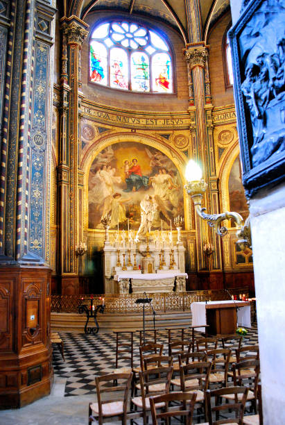 Chapel of the Virgin at Saint-Eustache (Paris, France) The Church of Saint-Eustache (Paris, France) exemplifies several architectural styles, such as Gothic, Renaissance, and French Gothic. The present building that is seen today was built between the years 1532 and 1632, but the church's beginning roots date way back to the 13th century. The Chapel of the Virgin was built in the year of 1640 and was inaugurated by Pius VII in 1804. The photograph that you see here was captured inside Saint-Eustache during August of 2008. église saint eustache stock pictures, royalty-free photos & images