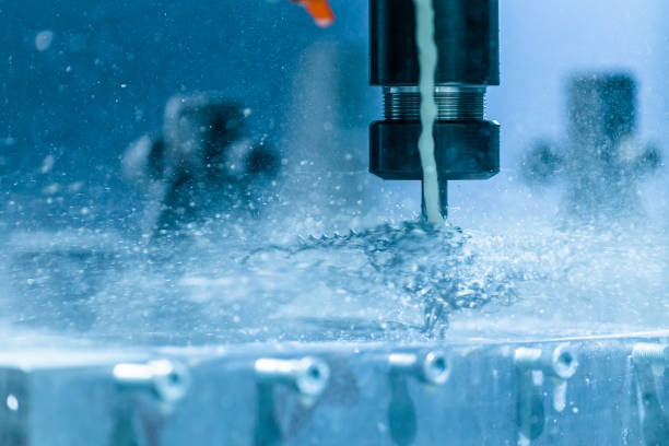 istock A close-up view on swarf wrapped over carbide drill while cnc drilling under liquid coolant. Feed and cutting speed adjusting problem. 1218457964