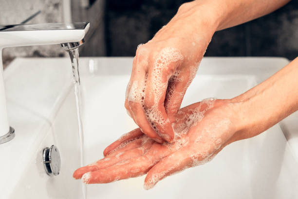 istock Coronavirus. Proper washing and handling of hands. Liquid antibacterial soap. Self-isolation and hygiene. 1218464478