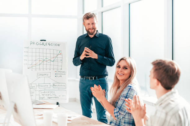istock employees applaud the speaker at the business presentation 1218478145