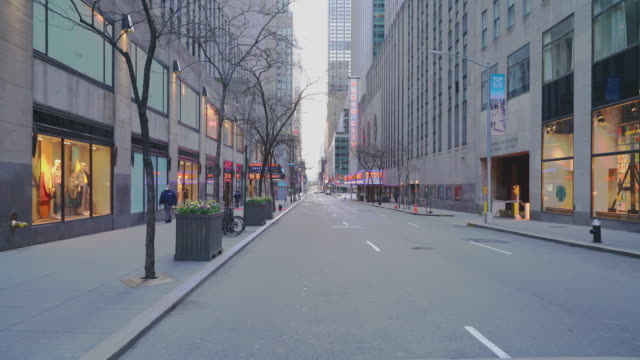 West 50 Street nearby Rockefeller Center, one of the most crowded destinations in New York City, abandoned due to the COVID-19 pandemic outbreak.