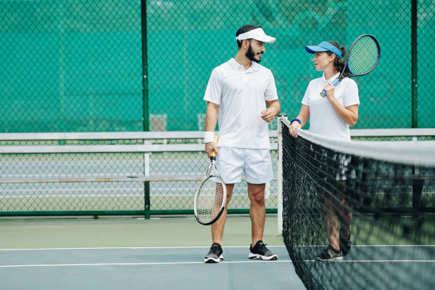 istock Couple plying tennis 1218489059