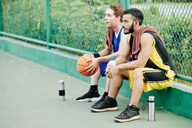 istock Resting basketball players 1218489080