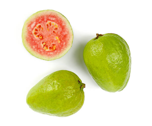 Overhead view of red guava isolated on white background. guava isolated, psidium guajava,guava isolated, psidium guajava, Overhead view, top view guava photos stock pictures, royalty-free photos & images