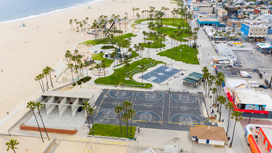 Aerial shot of empty Venice Beach, California boardwalk during the Coronavirus pandemic of 2020.