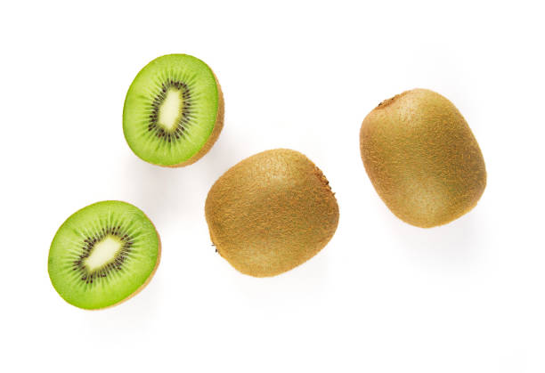 istock Overhead view of fresh Kiwi fruit isolated on white background. 1218492675