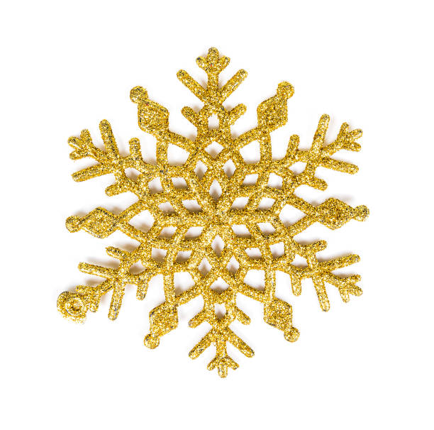 istock Gold glitter texture snowflake isolated on white background. 1218492769