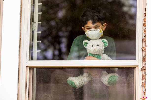 istock Young Boy Sheltering in Place at Home 1218493524