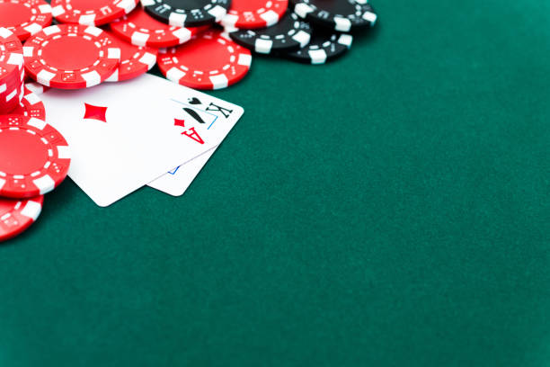 istock Ace and king with poker chips. 1218493578