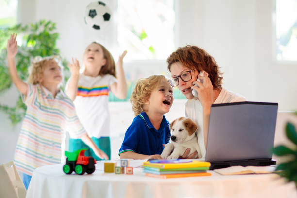 Mother working from home with kids. Quarantine.