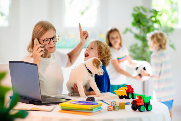 istock Mother working from home with kids. Quarantine. 1218495635