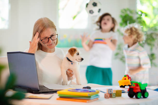 istock Mother working from home with kids. Quarantine. 1218496175