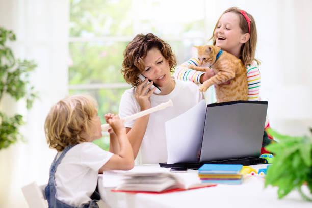 Mother working from home with kids. Quarantine.