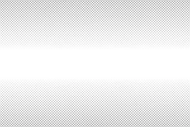 Photo of White and gray halftone background. Abstract dotted background. Fade gray dot from big to small dot.