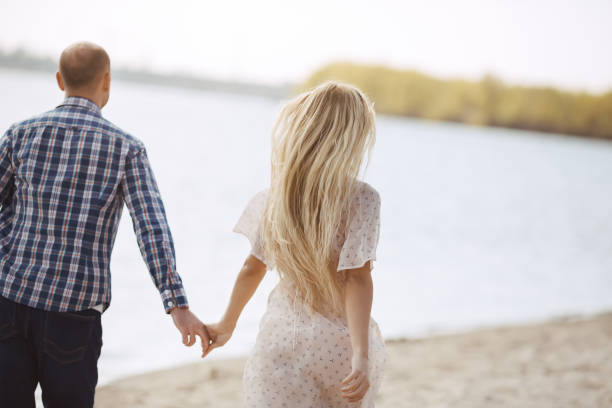 istock Couple in Love on Summer Beach 1218498348