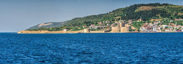 Kilitbahir castle in Turkey Canakkale, Turkey - 07.23.2019.  Kilitbahir castle and fortress on the west side of the Dardanelles opposite city of Canakkale in Turkey. Big size panoramic view on a sunny summer morning. dardanelles stock pictures, royalty-free photos & images