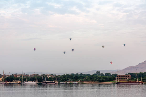 istock Hot air balloons over the harbor on Nile 1218499722