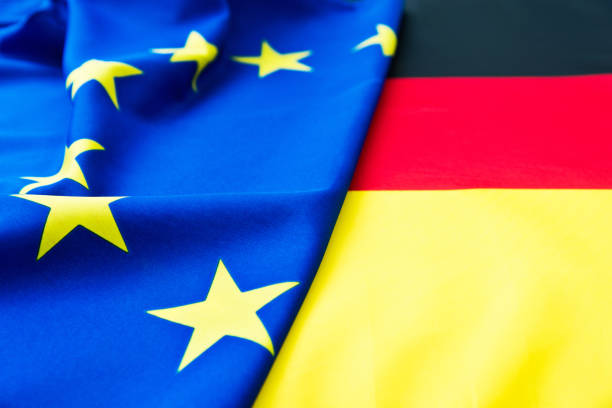 istock German and European Union flags 1218500843