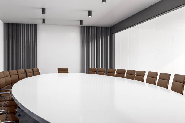 istock Furnished conference room with table, chairs and white board. 3D Rendering 1218501904