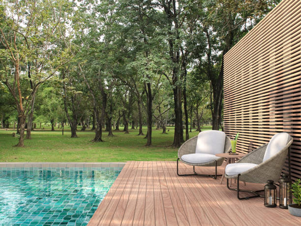 istock Swimming pool terrace with garden view 3d render 1218503390