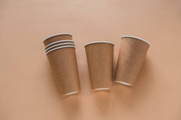 istock disposable paper biodegradable cups  on a beige background 1218504173