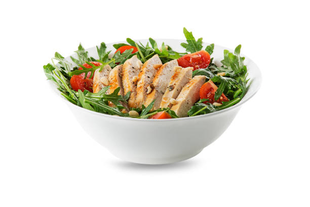 istock Green salad with chicken and arugula leaves 1218504269