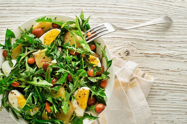 istock Healthy dandelion salad with mixed ingredients 1218504300