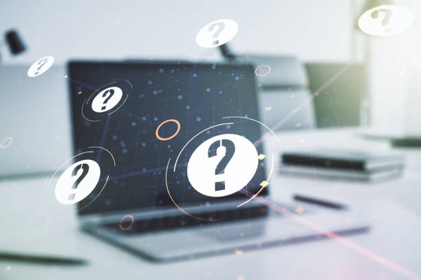 istock Creative concept of question mark illustration on modern laptop background. FAQ and search concept. Multiexposure 1218506508
