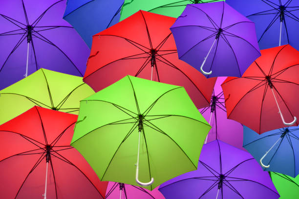 istock 3d,Beautiful colorful umbrellas in the sky 1218506626