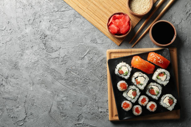 istock Composition with delicious sushi rolls. Japanese food 1218509256