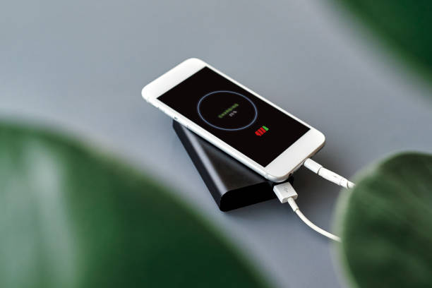 istock Charging smart phone with power bank 1218510004