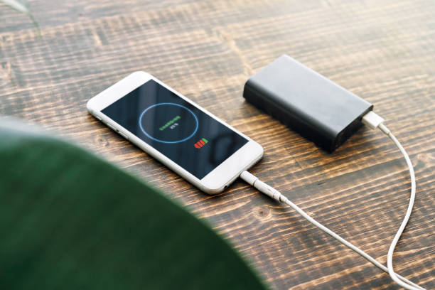 istock Charging smart phone with power bank 1218511381