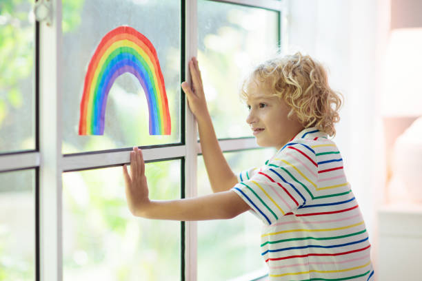 istock Coronavirus quarantine. Kids at window. Stay home. 1218512901