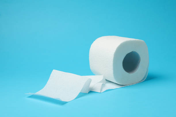 istock Toilet paper on blue background, space for text 1218514187