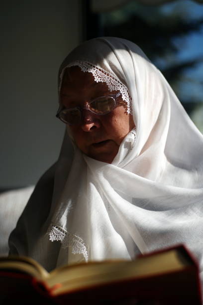 istock Muslim woman praying in Ramadan 1218515045