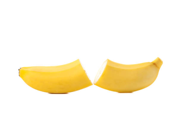 Flying banana slices, isolated on white background